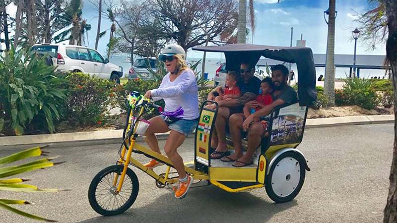 Take in the sights and sounds of Airlie Beach from the back of a tuk-tuk!